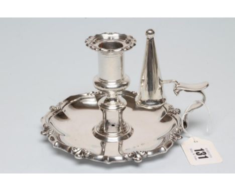 AN EARLY VICTORIAN SILVER CHAMBER STICK, maker Howard &amp; Hawksworth, Sheffield 1848, the lobed dished base with cast reede