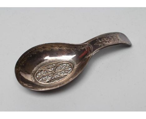 A LATE GEORGE III SILVER CADDY SPOON, maker Samuel Pemberton, Birmingham 1802, with bright cut engraved handle and filigree w