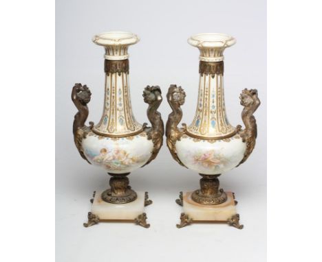 A LARGE PAIR OF FRENCH PORCELAIN GARNITURE VASES, late 19th century, of baluster form, painted in pastel colours with vignett