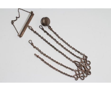 A LATE VICTORIAN SILVER CHATELAINE, maker Grey &amp; Co., London 1899, of graduating loop form, 3 1/2" wide, hung with five c