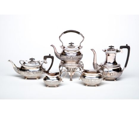 AN EDWARDIAN SILVER FIVE PIECE TEA AND COFFEE SERVICE, maker's mark RR, Sheffield 1903 and 1911 (coffee pot), of semi fluted 