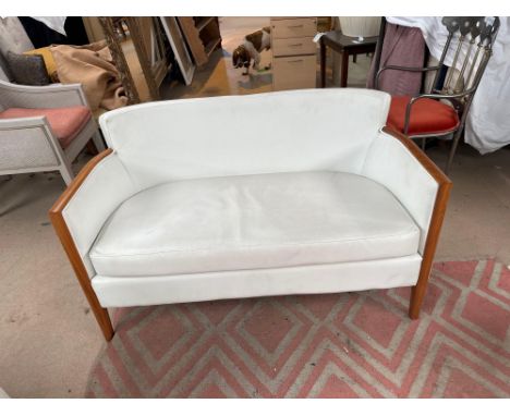 { Option of lots:  24 } C. S. Contract Furniture Of Shropshire Upholstered White Leather Two Seater Sofa On Wooden Legs 130 x