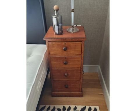 A pair of Tall Mahogany Bedside chests comprising of four drawers This cabinet is ideal to serve as a nightstand next to your