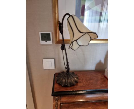 Judy Tiffany Table Lamp A classis swan neck Tiffany Lamp with a delightful floral design. Beautiful beige stained glass is us