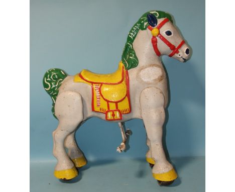 A vintage Mobo metal ride-on horse, (repainted), 76cm high and a plush rocking horse, (2). 