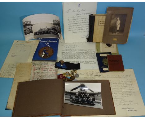 A quantity of mainly WWII photographs, including two of King George VI, service papers and other ephemera, including three co