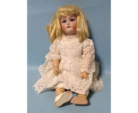 A Simon &amp; Halbig for Cuno &amp; Otto Dressel bisque-head doll with sleeping blue eyes, pierced ears, open mouth with four