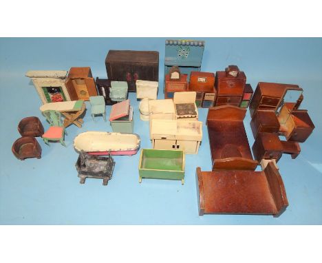 A quantity of doll's house furniture c1950's, including tinplate and diecast bathroom items, a diecast fireplace, wooden radi