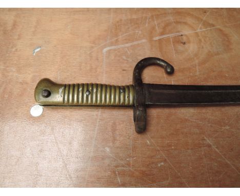 A French Sword Bayonet for the Chassepot Rifle 1866, no scabbard, blade length 57cm, overall length 69cm