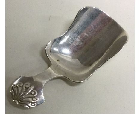 A silver caddy spoon with fluted handle. Birmingham 1918. By Levi and Salaman. Approx. 12 grams. Est. £20 - £30.