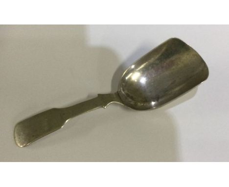 A large George III silver caddy spoon of plain form. Birmingham 1820. By Joseph Taylor. Approx. 12 grams. Est. £40 - £60.