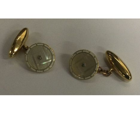 A pair of good quality 18 carat gold enamel and diamond cufflinks. Approx. 6 grams. Est. £100 - £150.