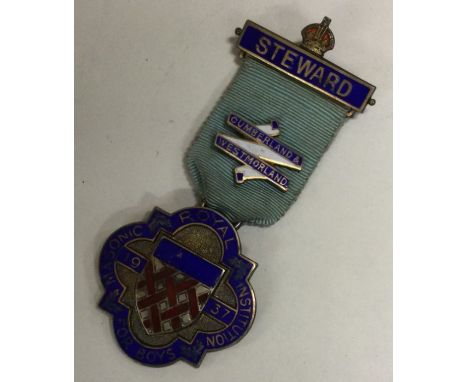 A silver and enamel Masonic medallion. Birmingham 1986. Retailed by Spencer of London. Approx. 27 grams. Est. £20 - £30.