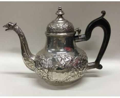 DUBLIN: A rare early 19th Century George III Irish silver eagle spouted teapot. 1818. By James Le Bas. Approx. 471 grams. Est