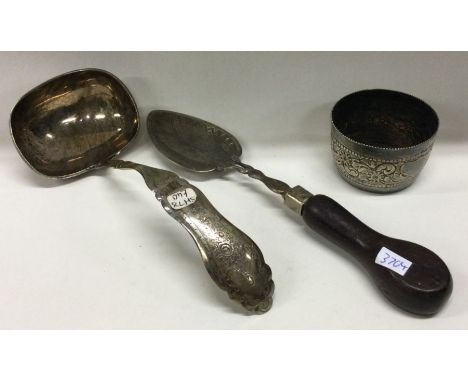 A Continental silver ladle etc. Approx. 108 grams gross weight. Est. £20 - £30.