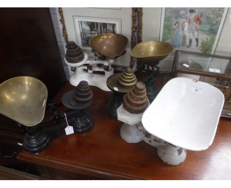 A SET OF VINTAGE ENAMEL KITCHEN SCALES with weights and two similar