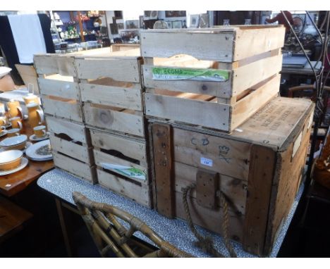 A VINTAGE WOODEN PACKING CRATE with rope handles and five wooden fruit crates