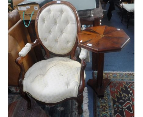 A VICTORIAN FRENCH STYLE OPEN ARMCHAIR with button upholstery, and an octagonal occasional table with sectional veneered top