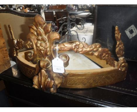 A CARVED GILTWOOD CORNER SHELF, with acanthus and swag decoration and bowfront white marble top, 22" wide