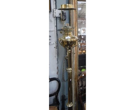 AN ART NOUVEAU STYLE BRASS ADJUSTABLE STANDARD OIL LAMP