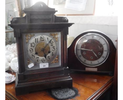 AN EDWARDIAN OAK-CASED MANTEL CLOCK and a walnut cased clock (2)