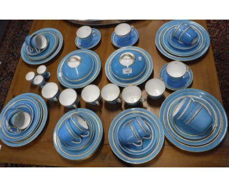 A 19TH CENTURY SPODE STYLE BLUE AND GILT PART BREAKFAST SET including two muffin dishes with rope-effect handles