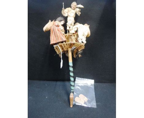 A DANCING AND CYMBAL PLAYING PUPPET NOVELTY with painted decoration 