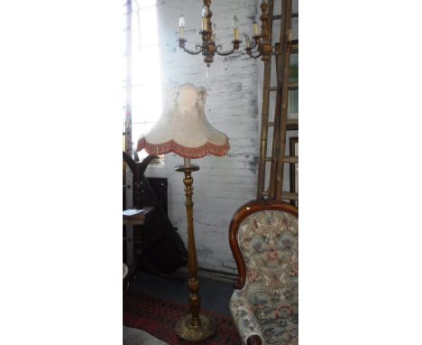 A GILTWOOD AND METAL FOUR BRANCH CHANDELIER, a matching three branch chandelier and a similar standard lamp