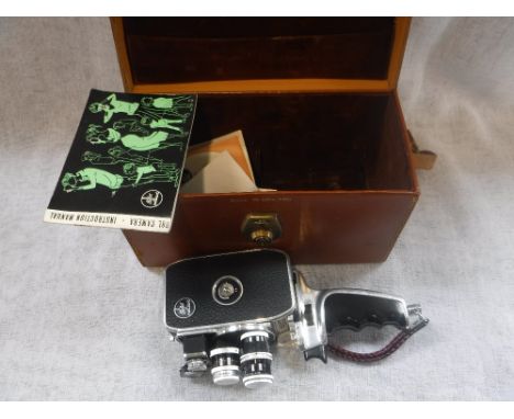 A VINTAGE BOLEX PAILLARD HAND HELD 8MM CINE CAMERA in a fitted leather case with instructions