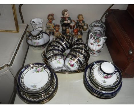 A COLLECTION OF GOEBEL 'HUMMEL' FIGURES, a Chinese ceramic cat, a Noritake teaset and other items