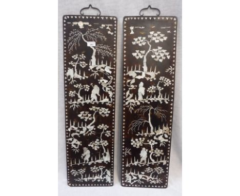 TWO MOTHER-OF-PEARL MOUNTED AND LACQUER HANGING WALL PANELS