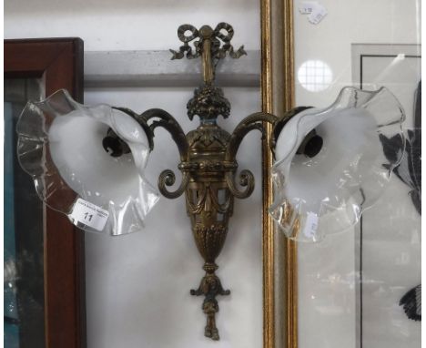 AN EDWARDIAN STYLE BRASS ELECTRIC TWO-BRANCH WALL LIGHT with opalescent and clear glass shades
