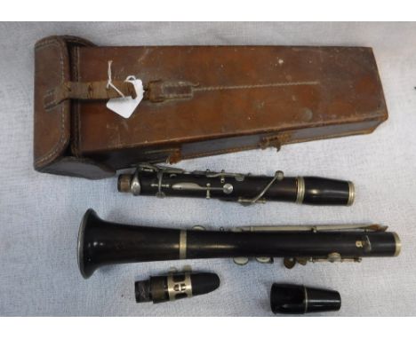 A CLARINET in leather case, the clarinet stamped 'Excelsior Sonoris..... RME 619'