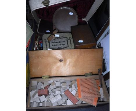 A CASE CONTAINING VINTAGE TINS and other items, and a box of toy bricks