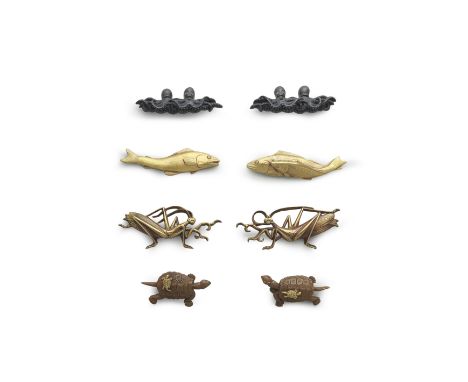 FIVE SETS OF MENUKI (HILT GRIPS)Edo period (1615-1868), 19th centuryThe first copper, shakudo, and gold, as a cock and hen ph