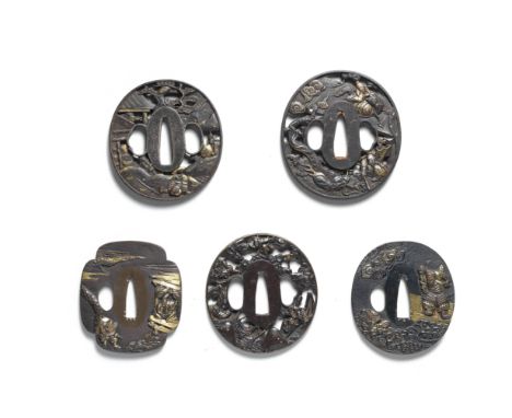 FIVE TSUBA (HAND GUARDS)Edo period (1615-1868), 18th to 19th centuryThe first three iron; the first oval, pierced and inlaid 