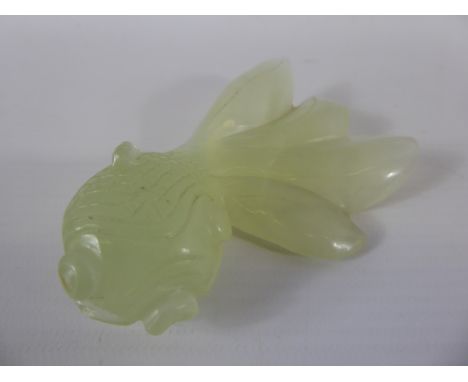 A Chinese Celadon Green Jade Carving of a Fantail Fish, approx 10 cms.