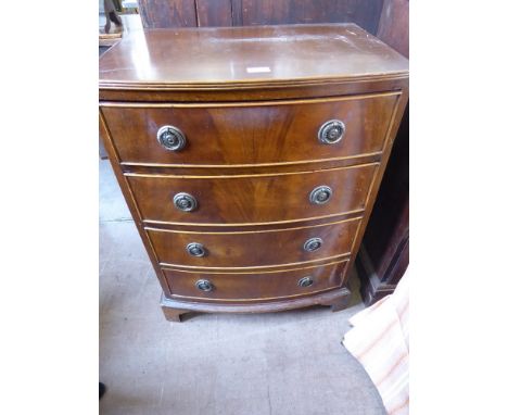 A Bow Fronted Mahogany Chest of Drawers, the chest having four drawers on bracket feet, approx 60 x 45 x 82 cms.