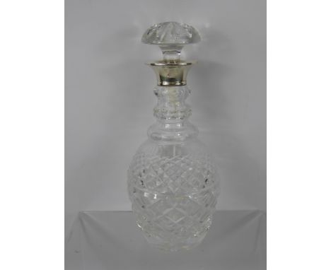 A Kayser Art Nouveau Polished Pewter Centre Piece, with cut glass liner, together with a silver collared decanter and stopper