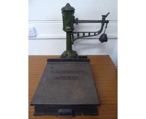 Green Cast-Iron Henry Pooley & Son Scale, with a quantity of weights.