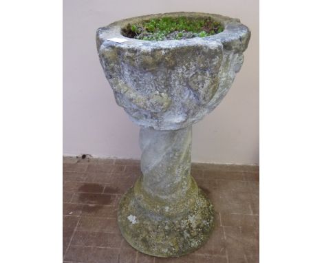 An Antique Stone Planter, fixed to a composite stone plant stand, approx 80 cms h