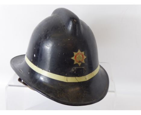 A Vintage Leading-Fireman's Helmet, Gloucestershire Fire Service.