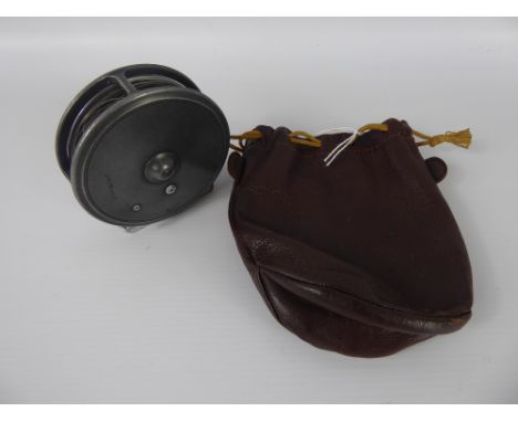 A Vintage Aluminium Hardy Bros Light Weight Trout Reel, in the original leather pouch.