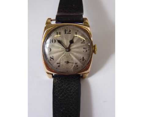 A Gentleman's 9 ct Gold Vintage Rolex Wrist Watch. The watch having an engine turned face with minute dial, case nrd 43687, 1