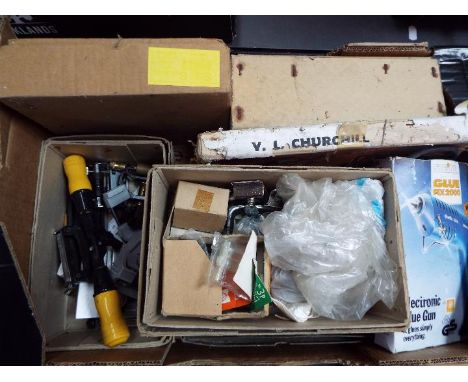 Various mixed tools and similar including wall brackets, electric glue gun, box of dowels, pliers and other.