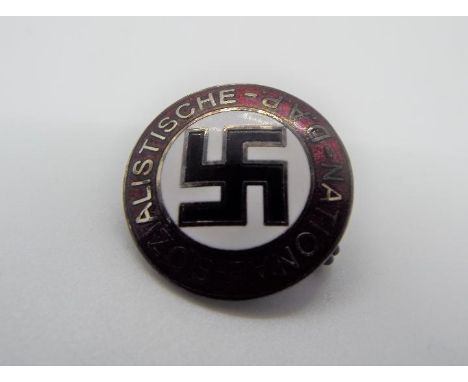 An enamel badge with a German design