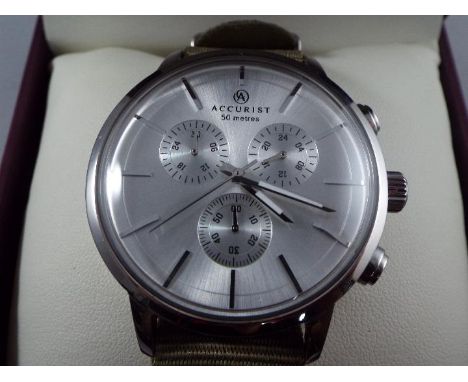 An Accurist quartz chronograph wristwatch, stainless steel case on a sage fabric band in original box with instructions, unwo