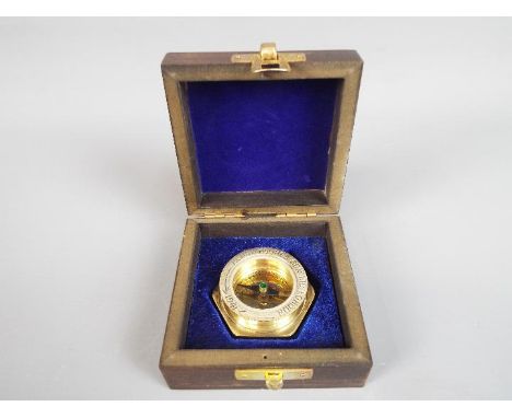 A Henry Hughes boxed brass compass