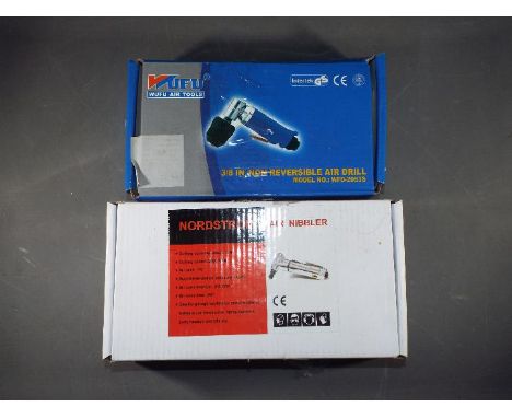Two boxed air tools. (2) (airt2) 