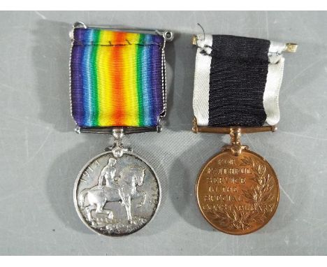 A WWI British War Medal named to PTE E V P TILLEY E SURR R and a Special Constabulary Long Service Medal (George V, crowned h